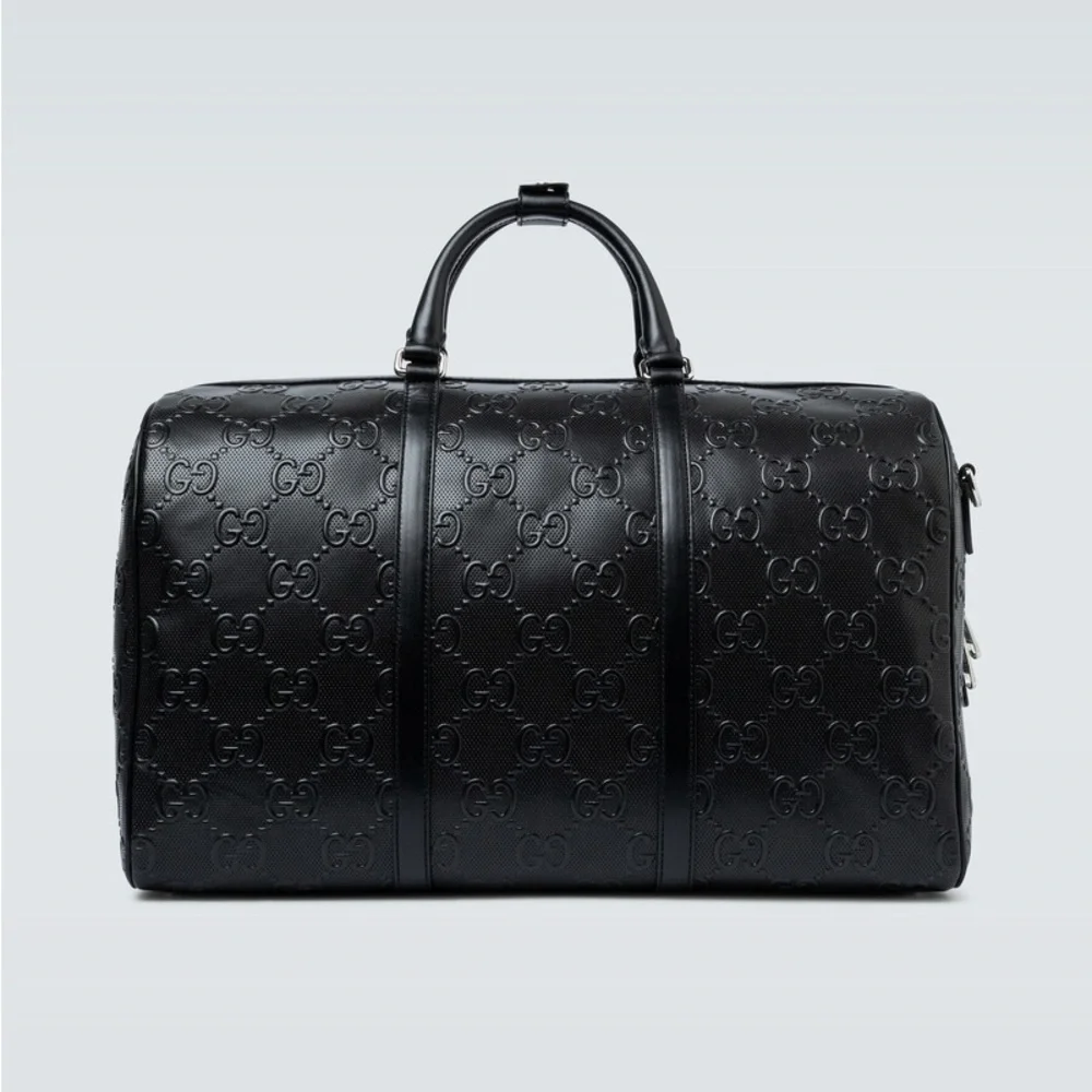 New! Gucci GG embossed black leather duffel bag